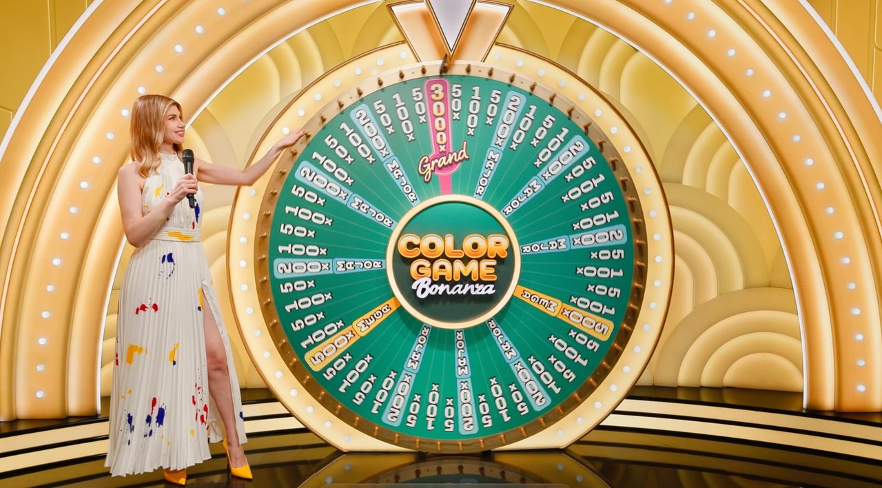 The Jackpot Round wheel with the host: prizes from 50x, Major 200x, Mega 500x and the 3,000x Grand.